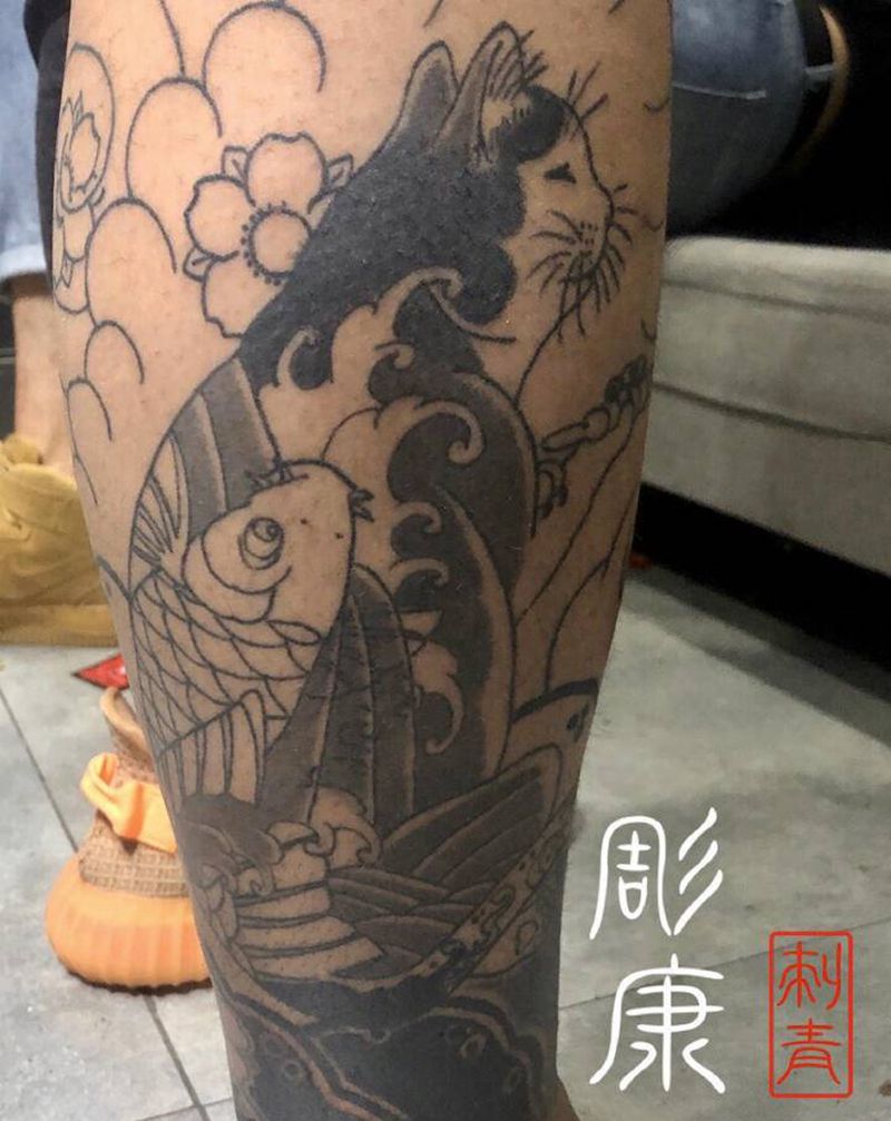 猫咪 宝珠纹身图片_腿部新传统纹身图案