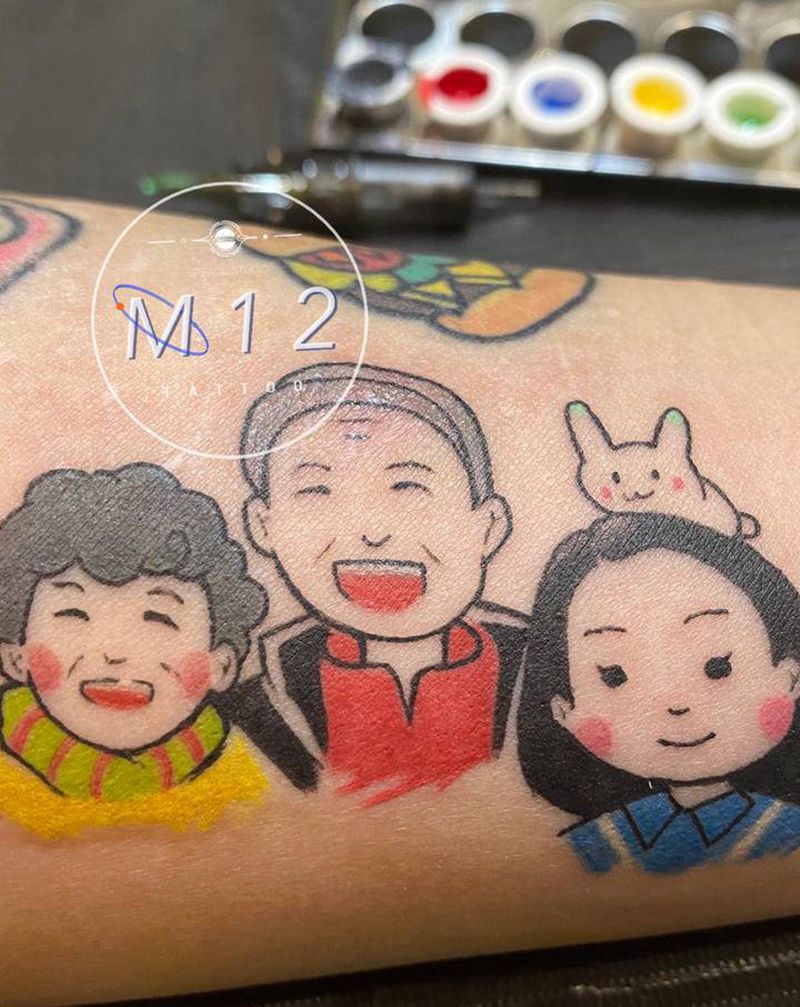 卡通全家福纹身图片_手臂卡通纹身图案