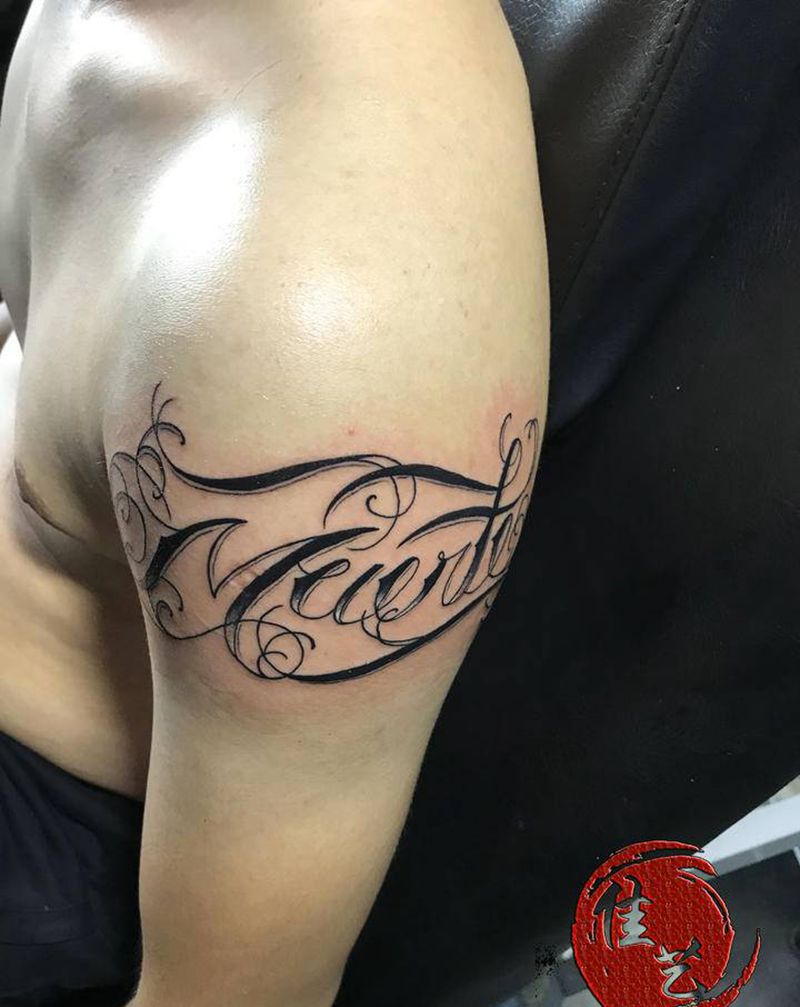 花体字纹身图片_手臂花体字纹身图案