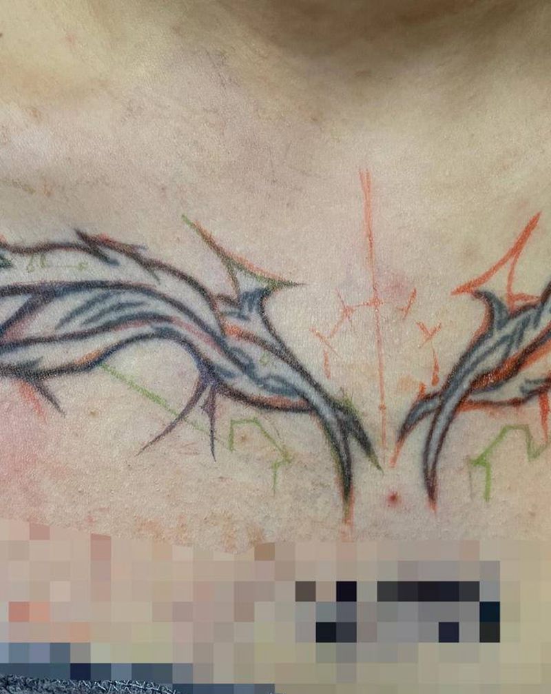 纹身修改纹身图片_胸部几何暗黑纹身图案