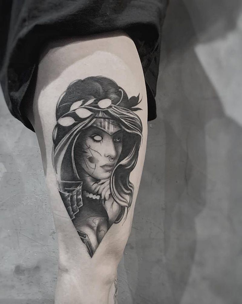 女郎纹身图片_腿部欧美写实纹身图案