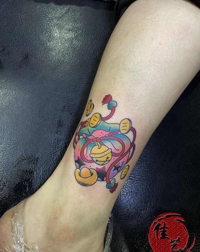 百宝袋纹身图片_腿部水彩纹身图案