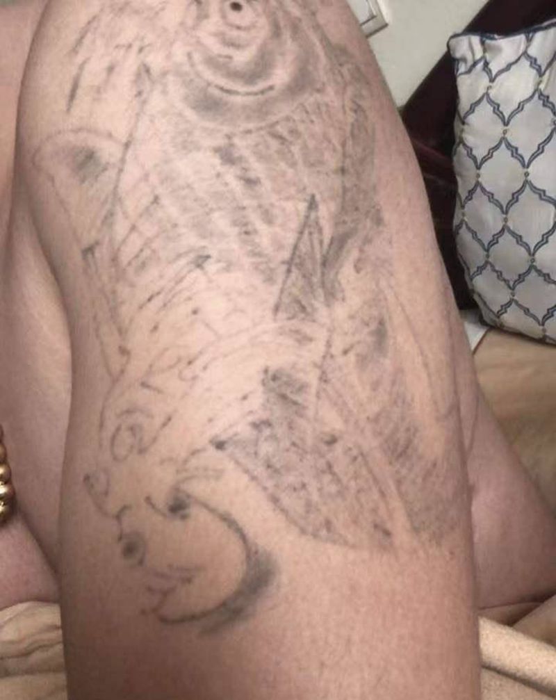 大臂遮盖纹身图片_欧美写实纹身图案