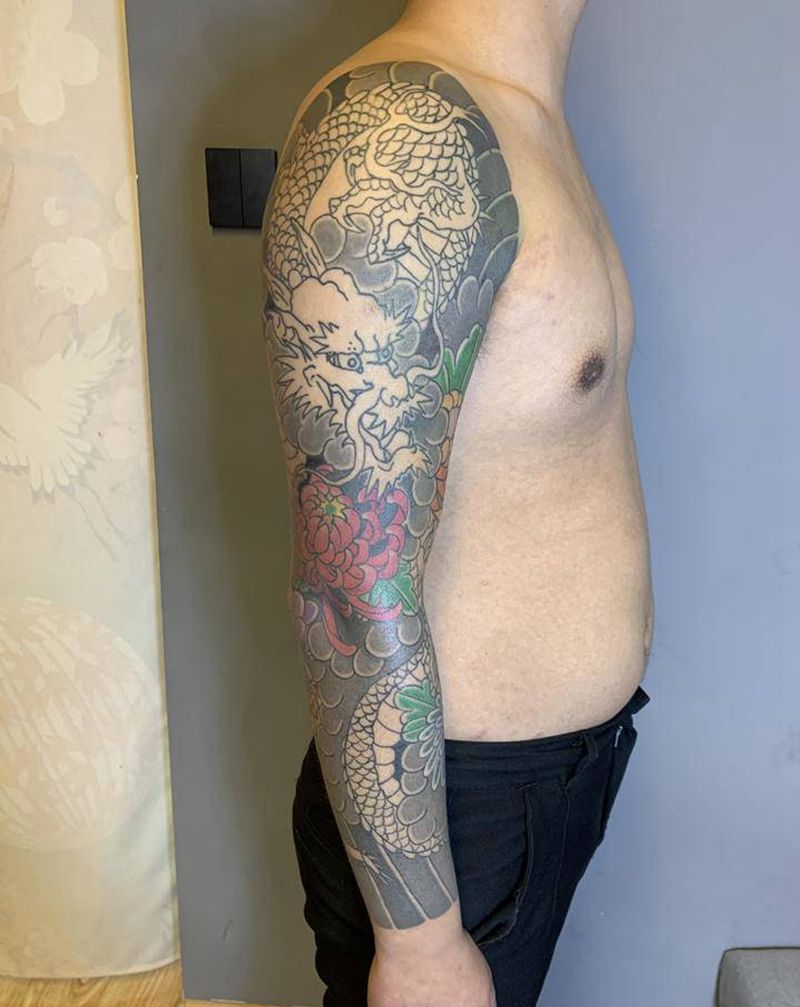 老传统龙纹身图片_手臂老传统纹身图案