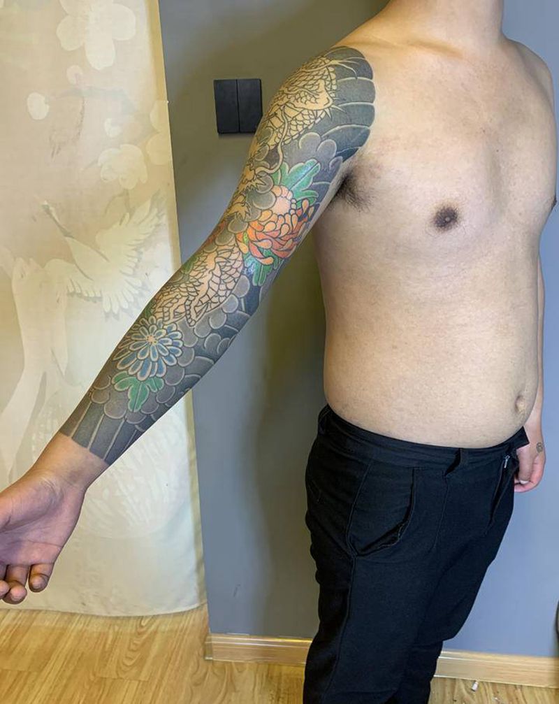 老传统龙纹身图片_手臂老传统纹身图案