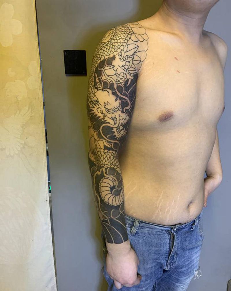 未完成纹身图片_手臂老传统纹身图案