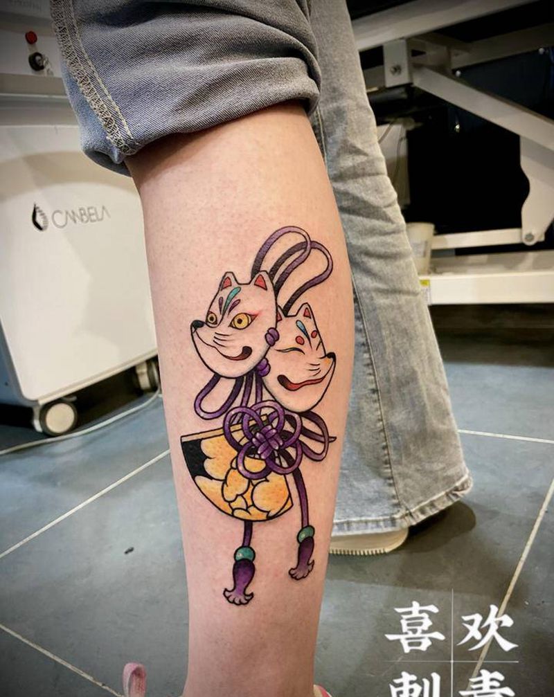 狐狸扇子面具纹身图片_腿部老传统狐狸扇子纹身图案