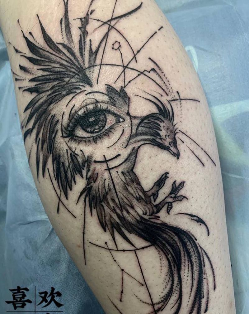 凤凰眼睛纹身图片_腿部几何水墨凤凰眼睛纹身图案
