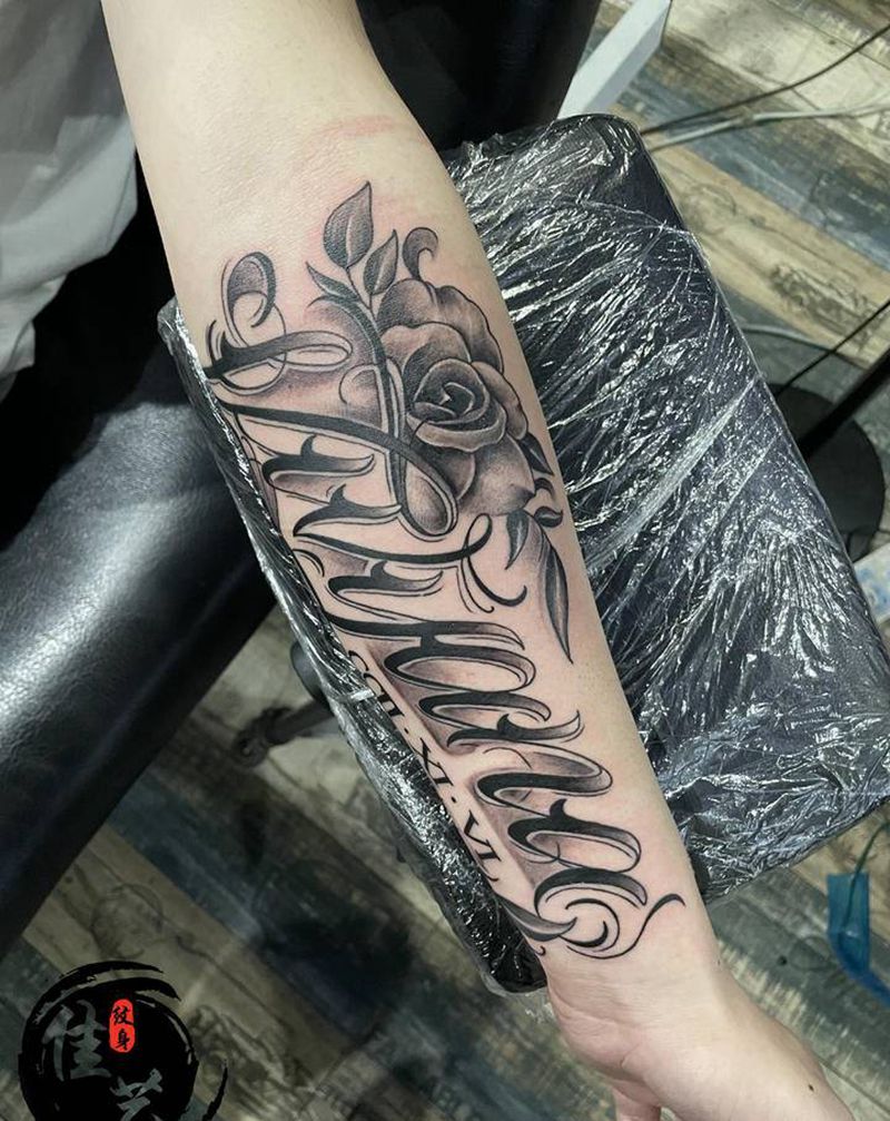 花体字纹身图片_手臂花体字纹身图案