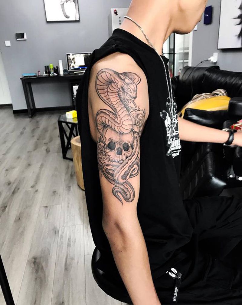 蛇纹身图片_手臂新传统纹身图案