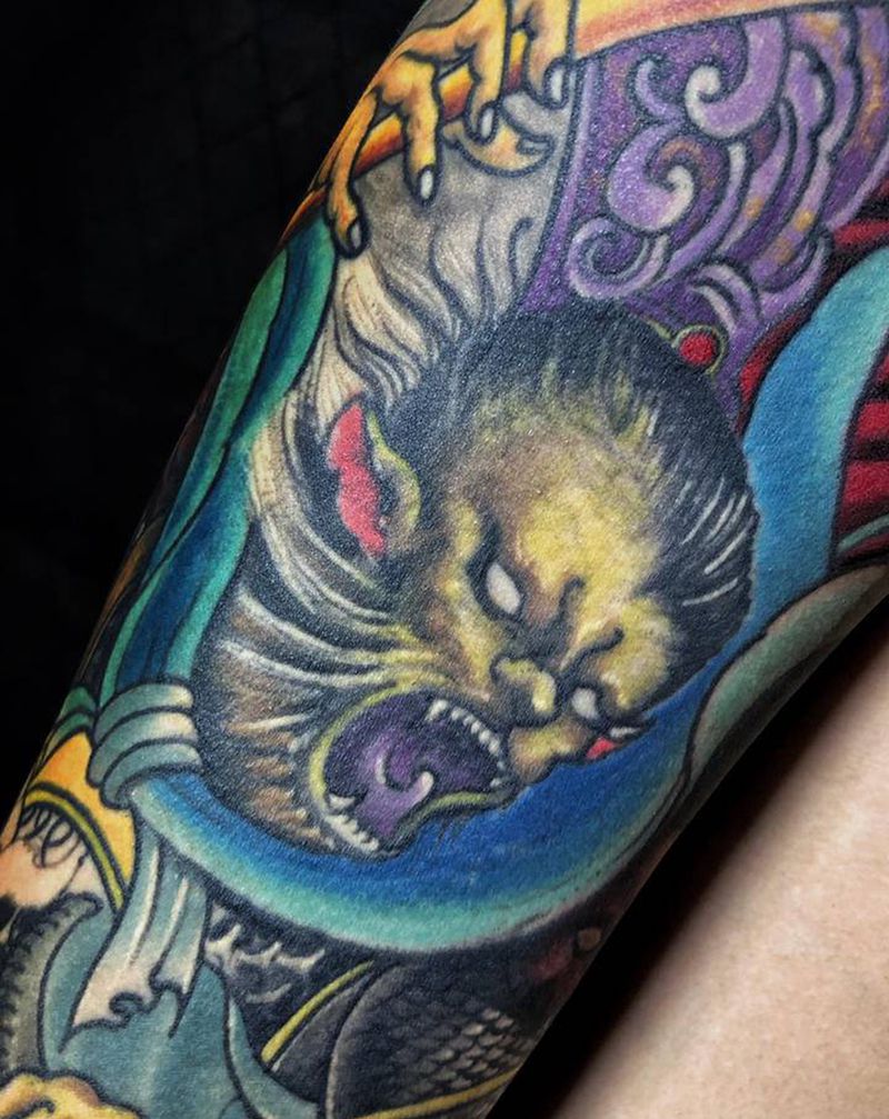 大战牛魔王纹身图片_手臂新传统纹身图案