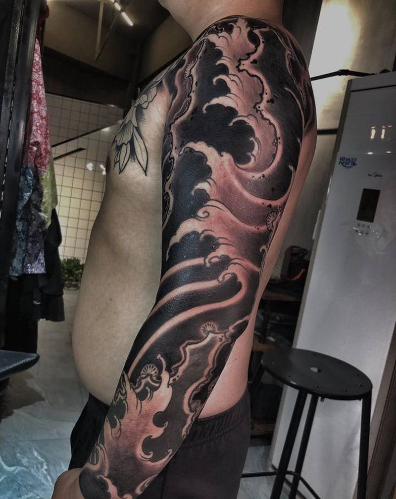 浪臂纹身图片_手臂纹身图案