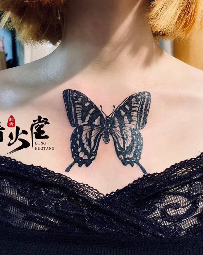 沃斯泥蝶纹身图片_胸部纹身图案
