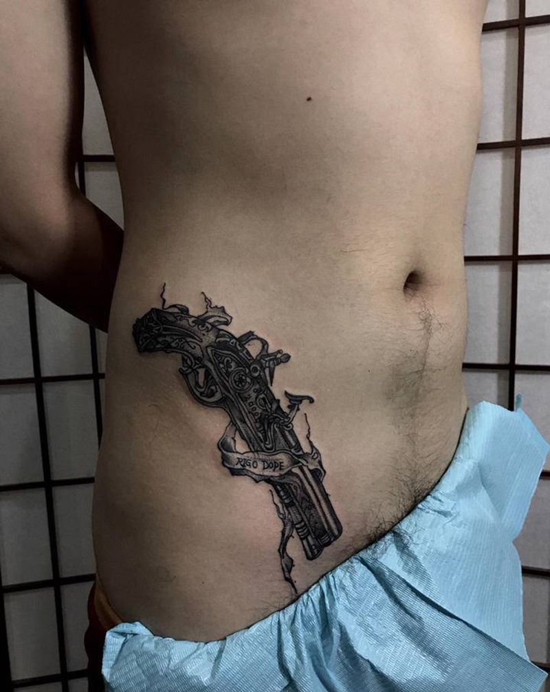 火铳纹身图片_脚部New School纹身图案