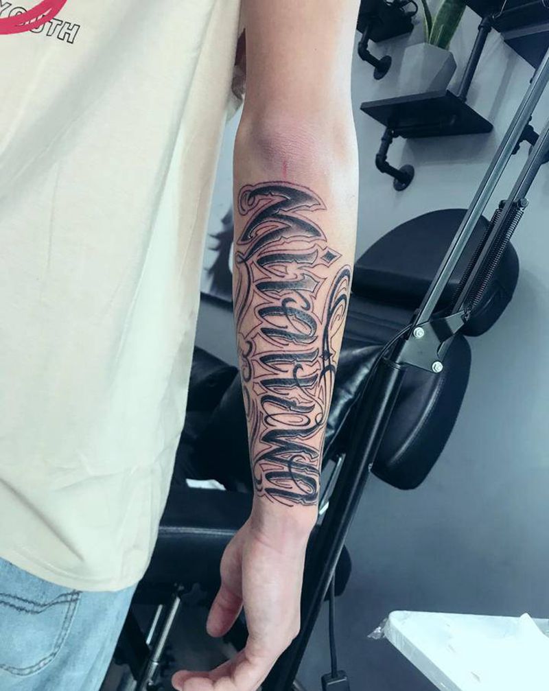 花体英文纹身图片_手臂纹身图案