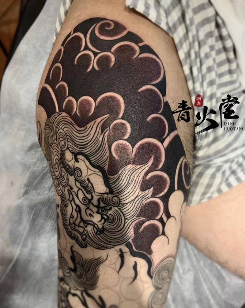 唐狮纹身图片_腿部老传统纹身图案