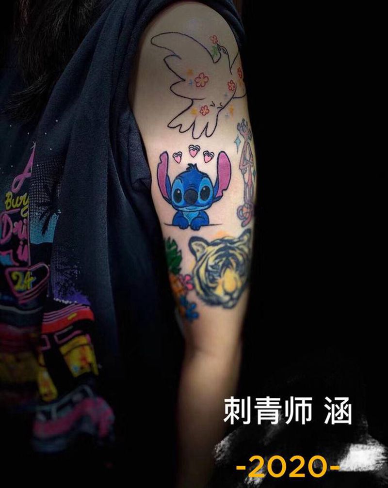 动漫题材纹身图片_手臂动漫史迪仔菠萝屋纹身图案