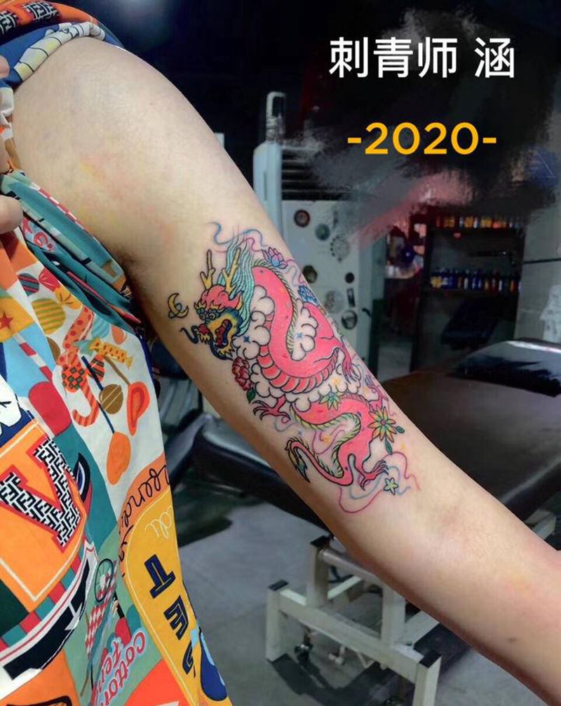 玛卡龙纹身图片_手臂龙纹身图案