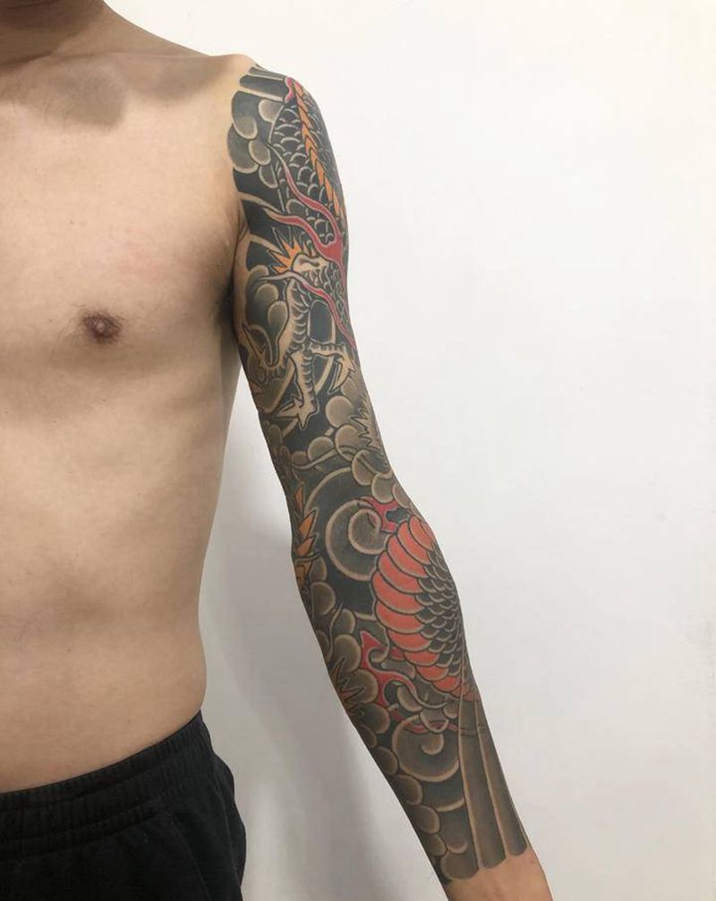 老传统龙遮盖花臂纹身图片_手臂老传统龙纹身图案