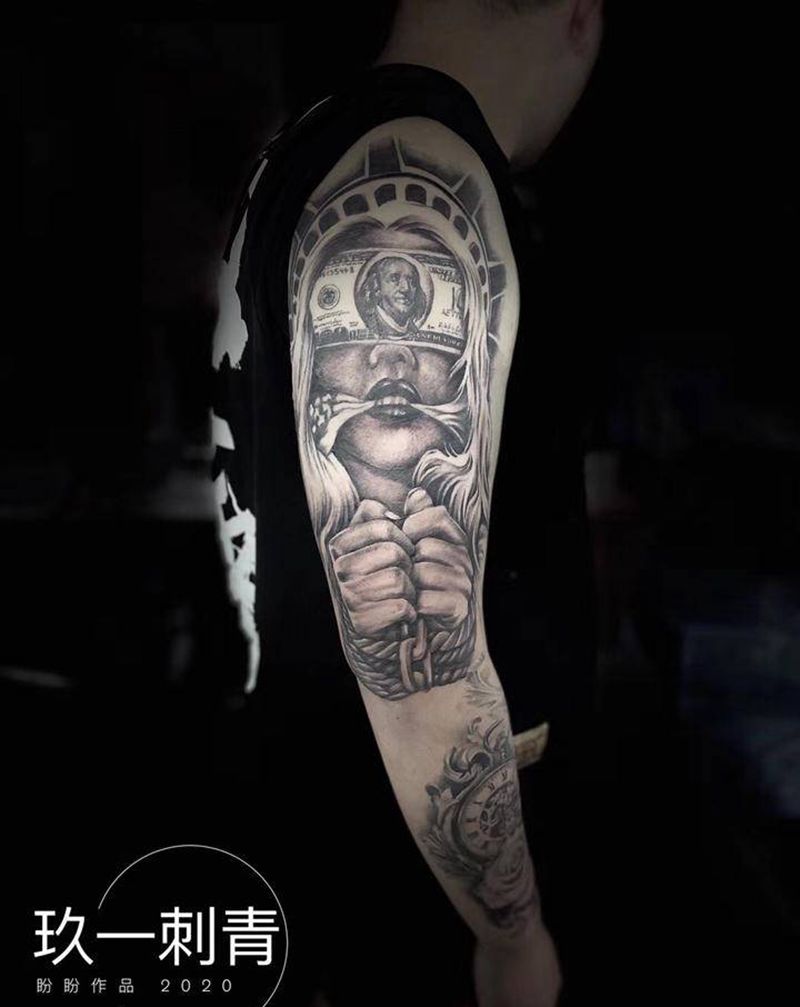 钱奴纹身图片_手臂欧美写实纹身图案