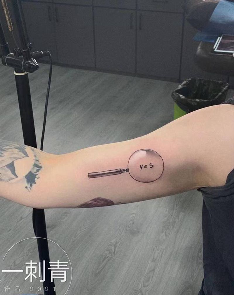 放大镜纹身图片_手臂纹身图案