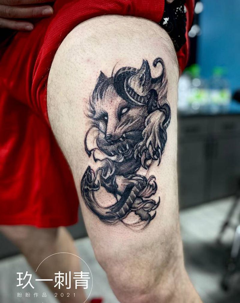 狐狸与蛇纹身图片_腿部欧美写实纹身图案