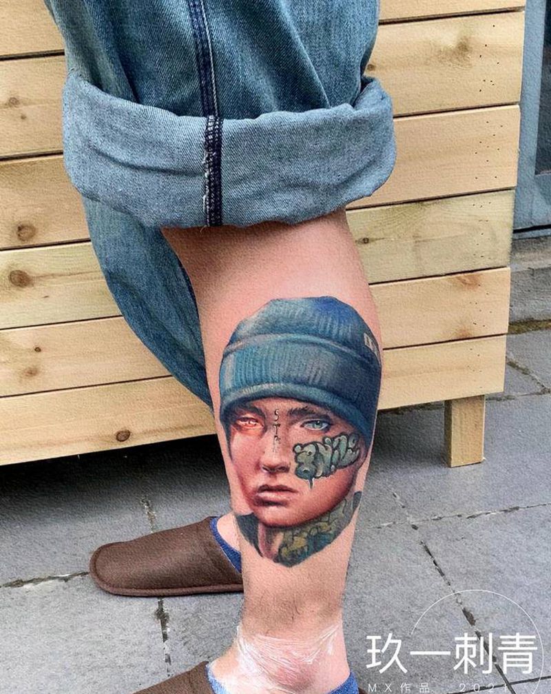 Eminem纹身图片_腿部欧美写实纹身图案