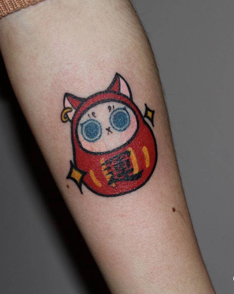 好运达摩纹身图片_手臂纹身图案