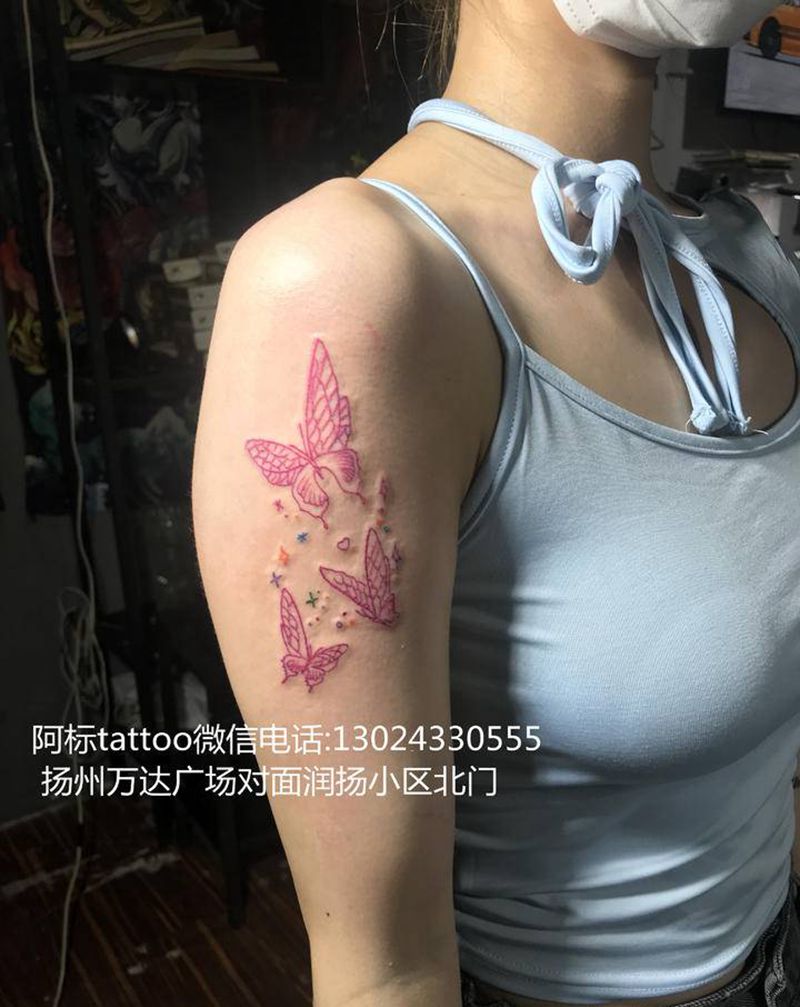 胡蝶纹身图片_手臂老传统纹身图案