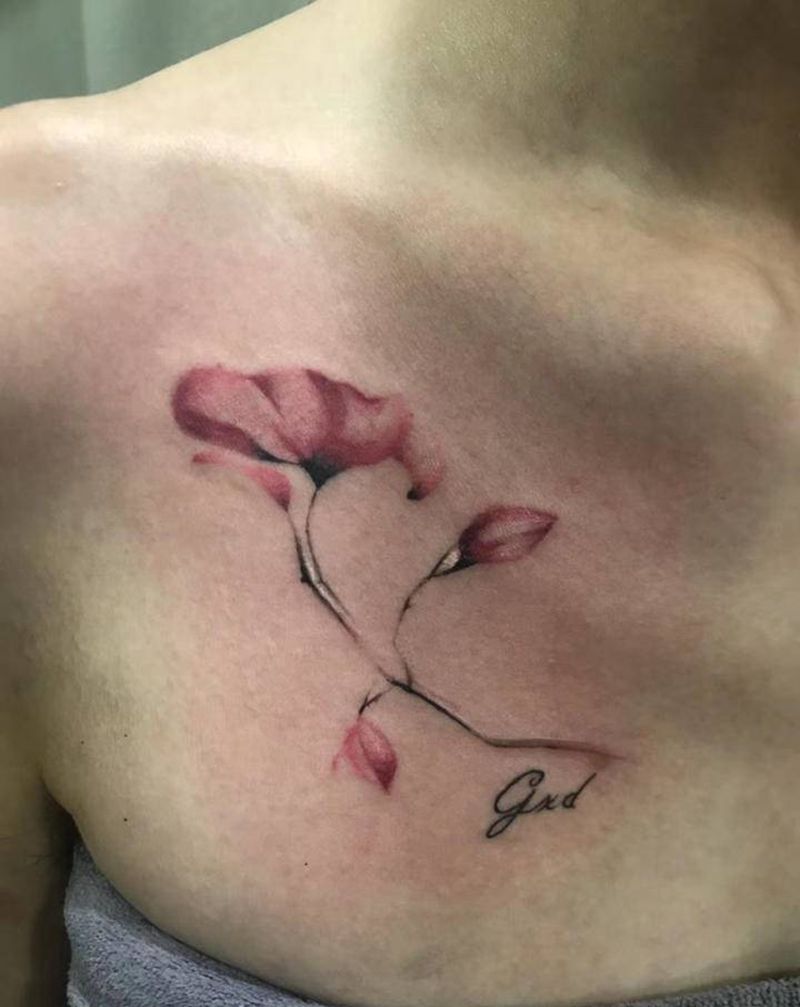 花纹身图片_胸部纹身图案