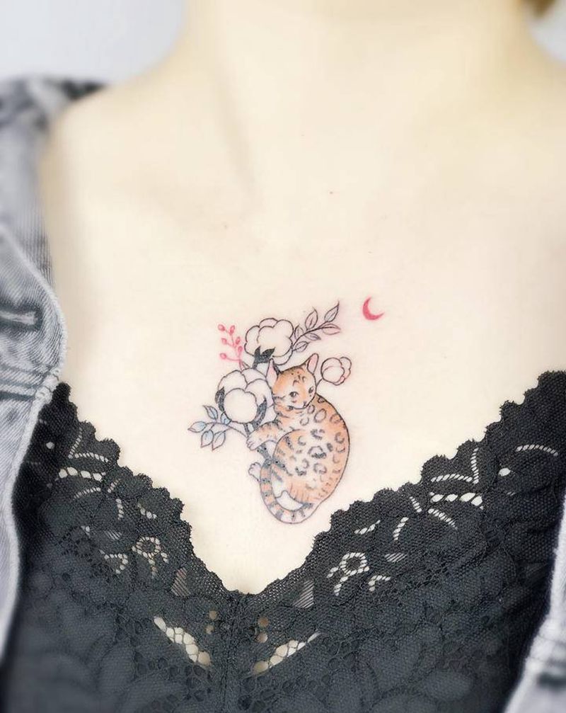 胸口的小猫咪纹身图片_胸部Old School纹身图案