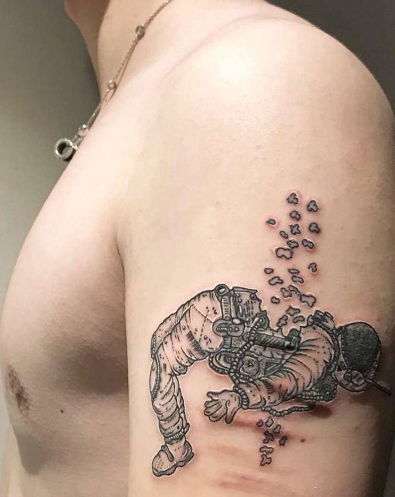 宇航员纹身图片_手臂几何点刺纹身图案