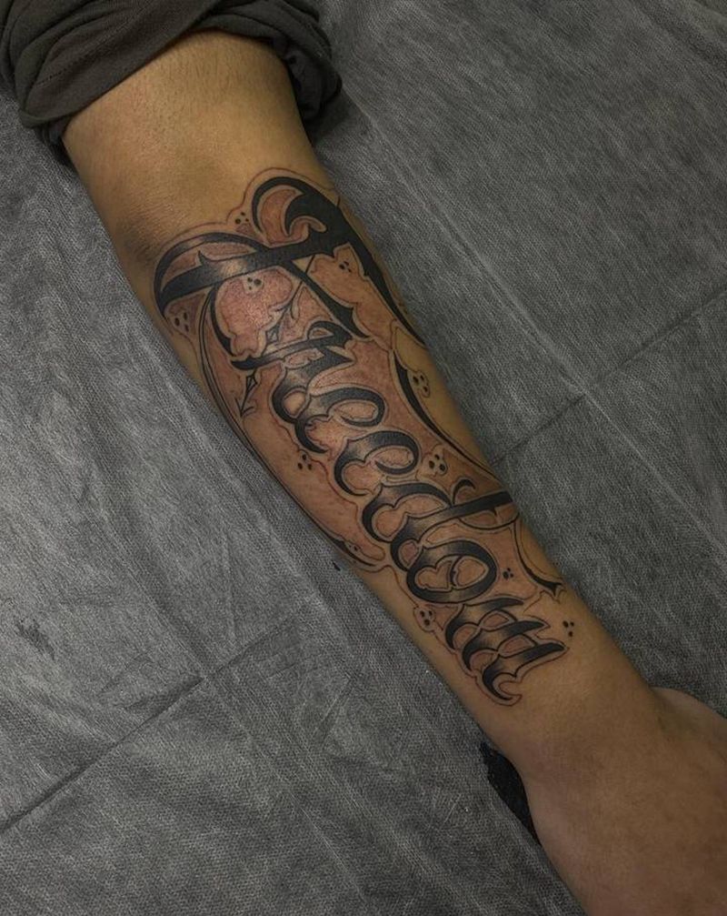 原创设计纹身图片_手臂花体字纹身图案