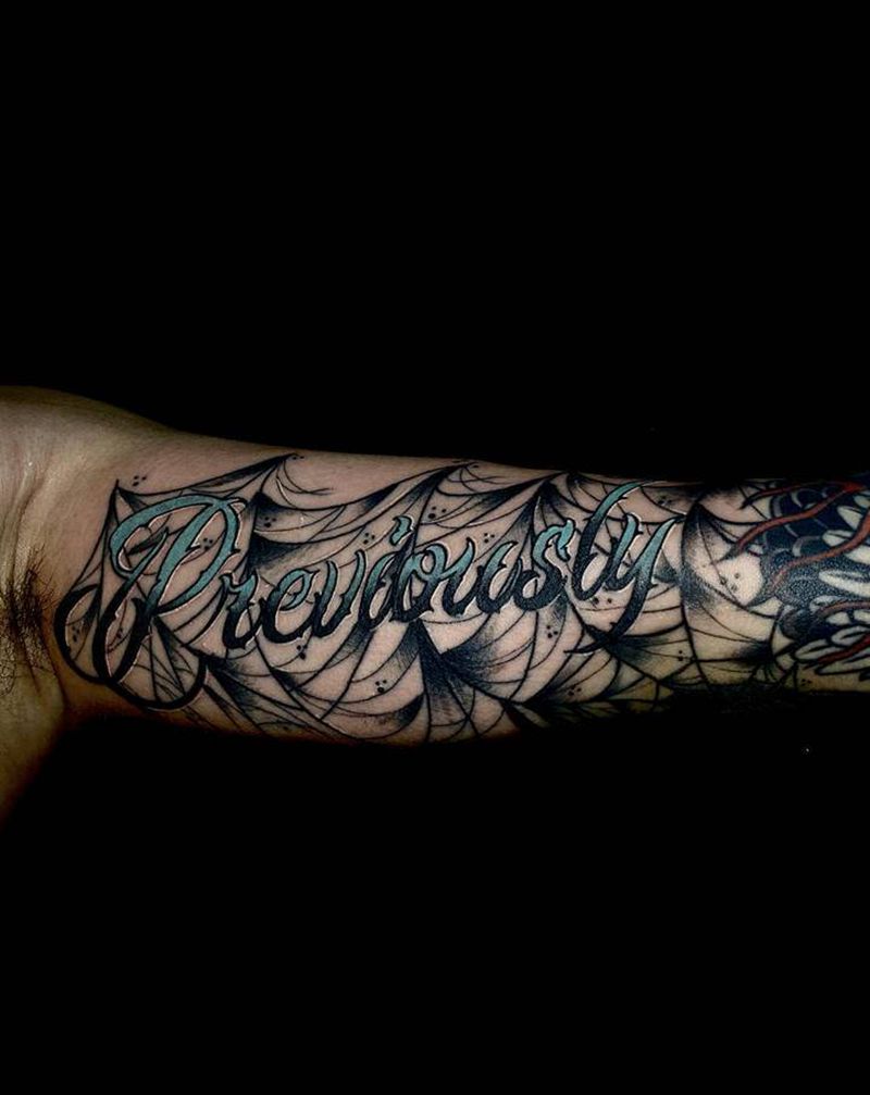 设计纹身图片_手臂花体字纹身图案