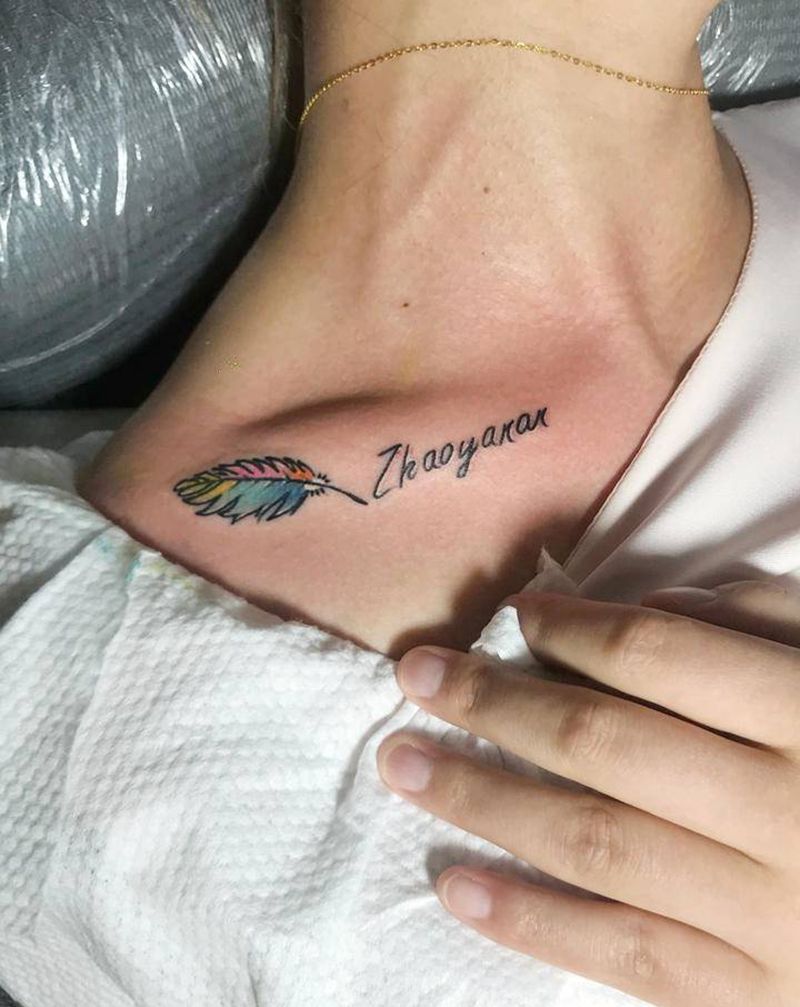 羽毛纹身图片_胸部水墨水彩纹身图案