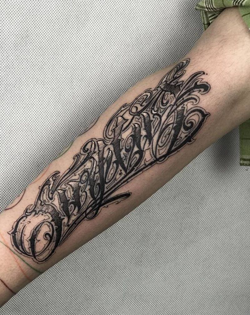 花体字设计纹身图片_手臂花体字点刺纹身图案