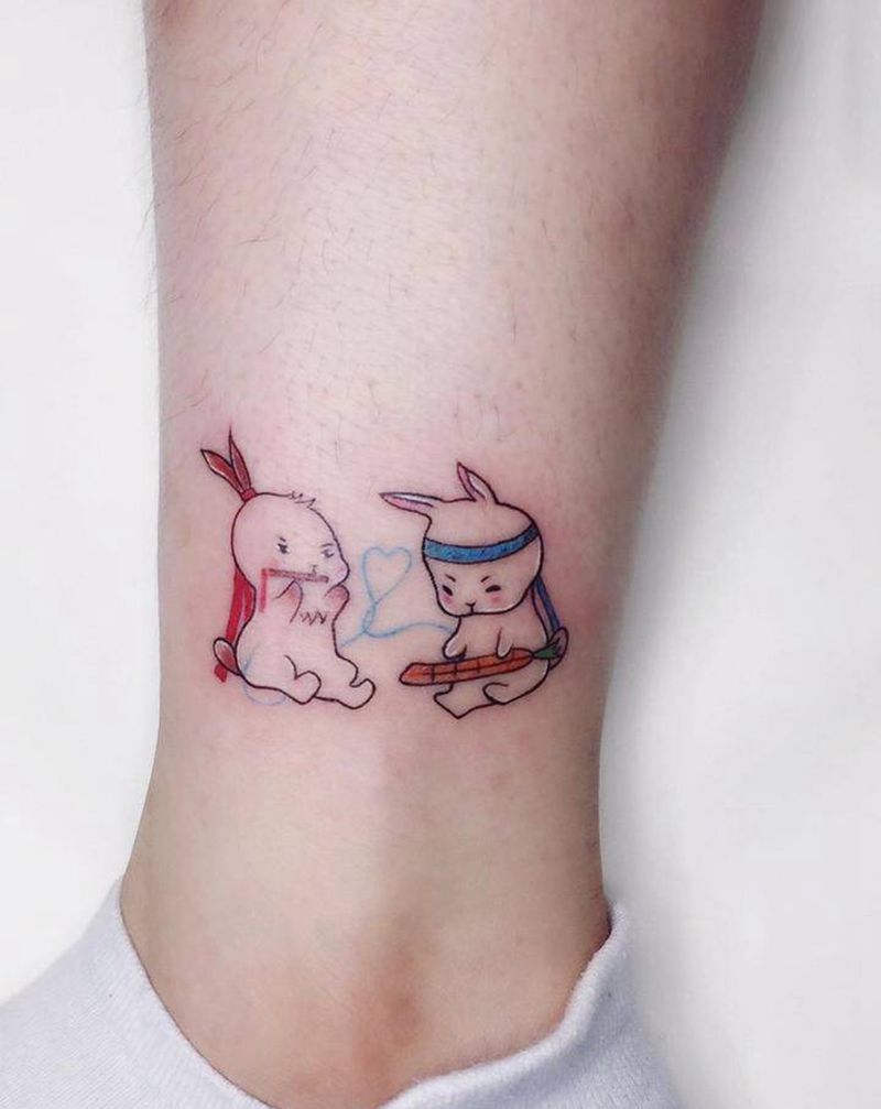 小兔兔纹身图片_腿部水彩点刺纹身图案