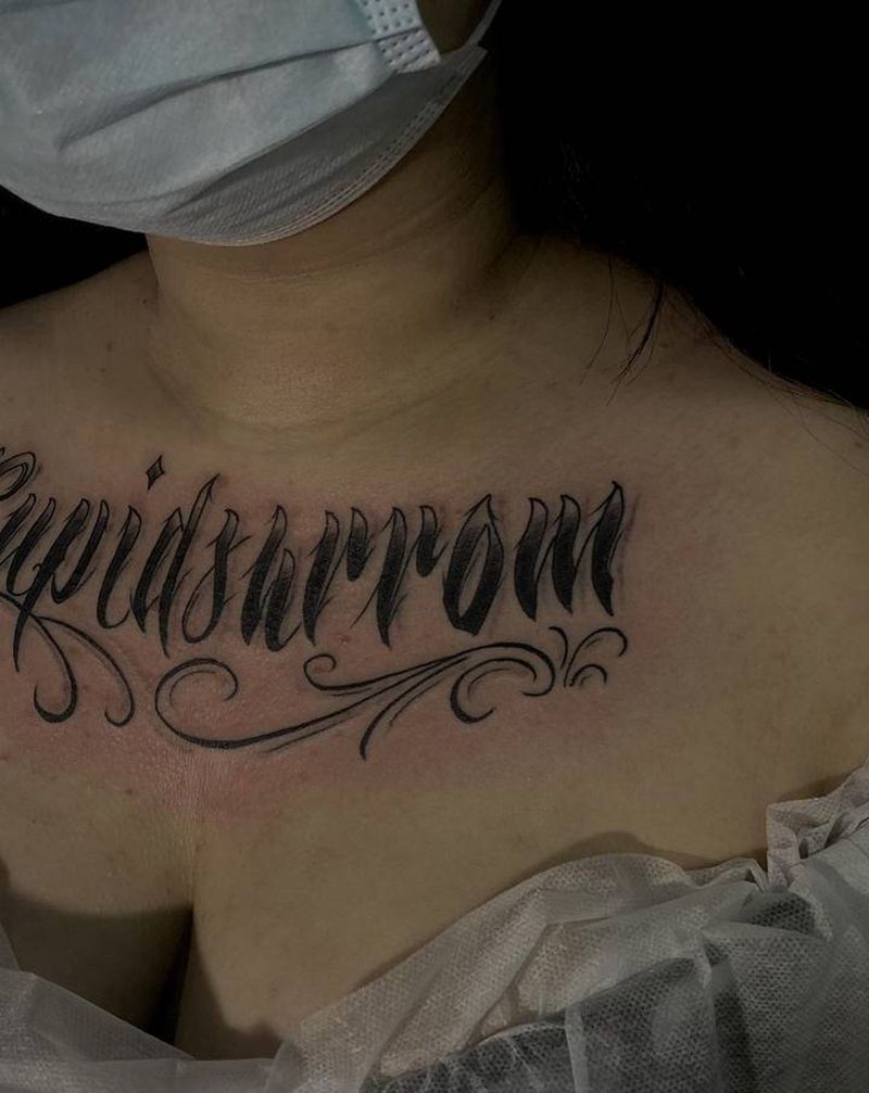 Cupid's arrow纹身图片_胸部花体字纹身图案