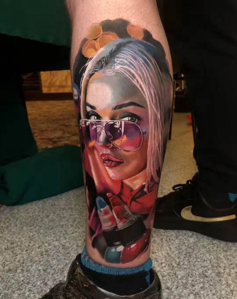 美女肖像纹身图片_腿部欧美写实纹身图案