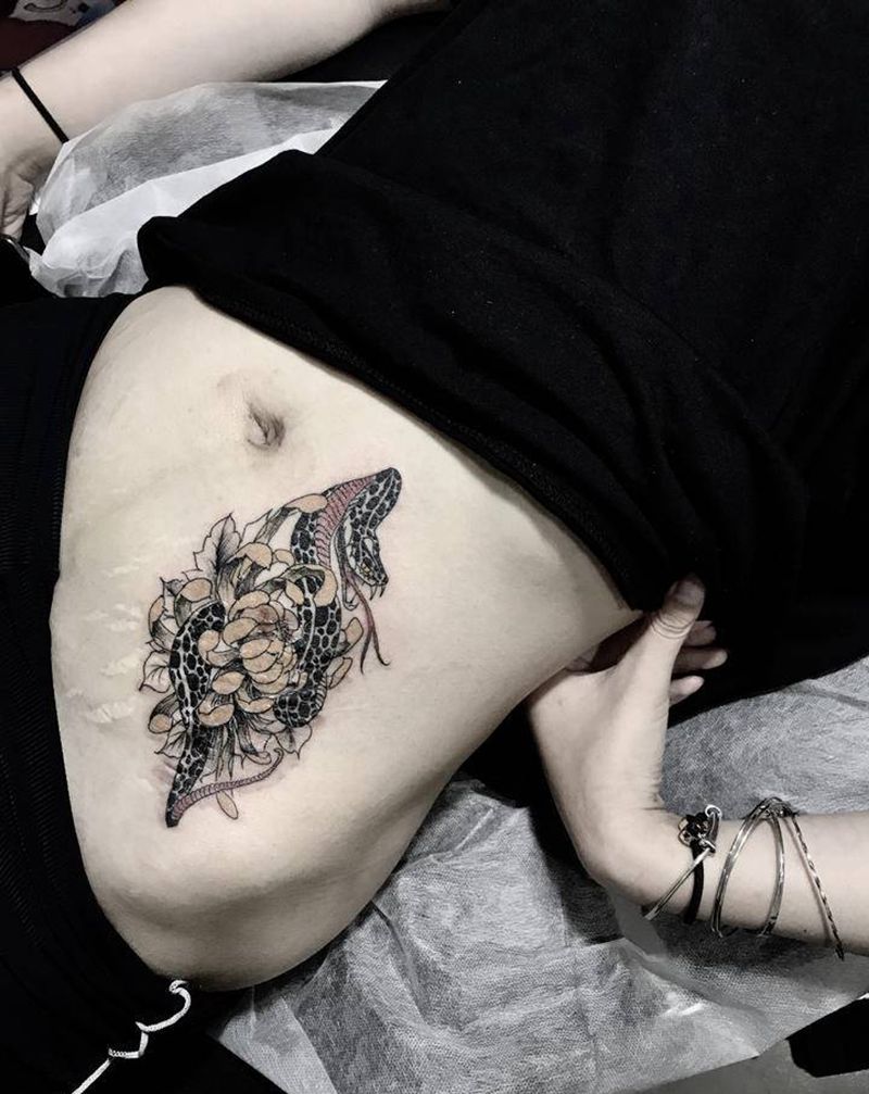 疤痕遮盖纹身图片_腹部老传统纹身图案