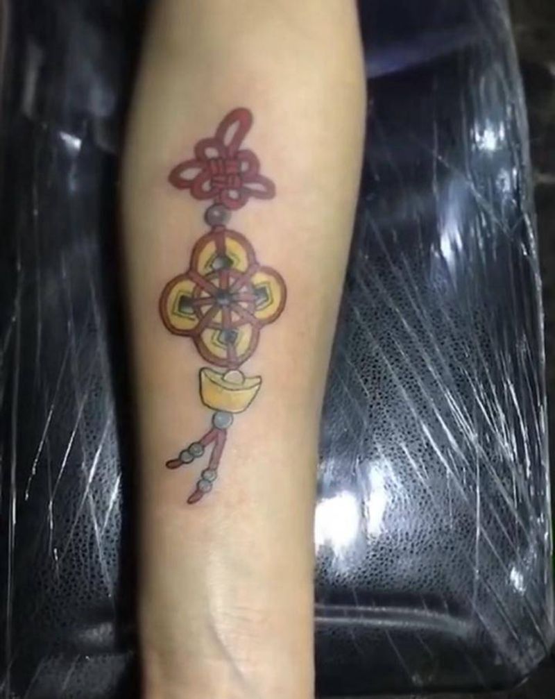 挂件纹身图片_手臂纹身图案