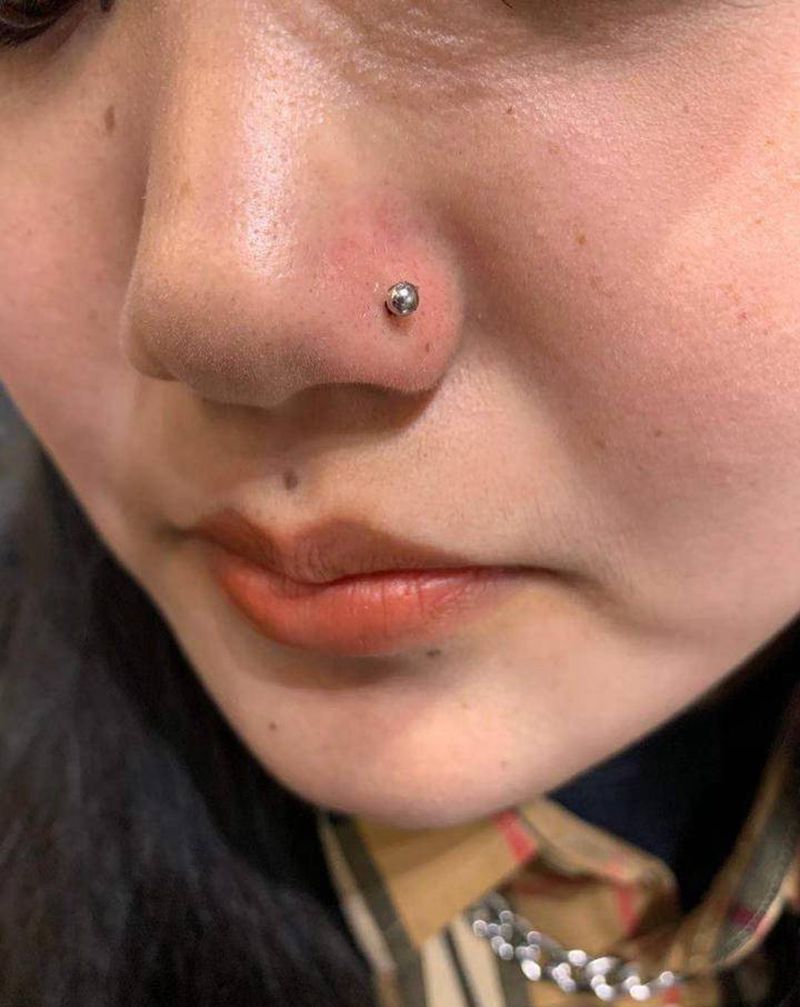 鼻钉纹身图片_穿刺纹身图案