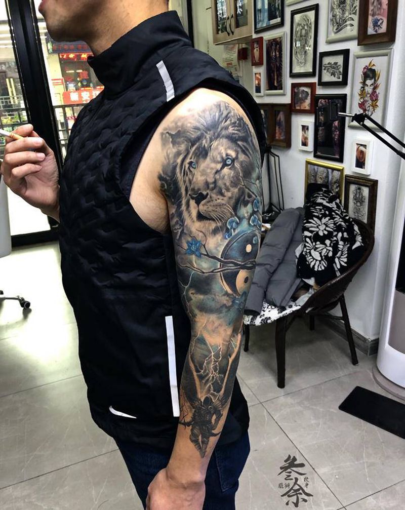 花臂纹身图片_手臂欧美写实纹身图案