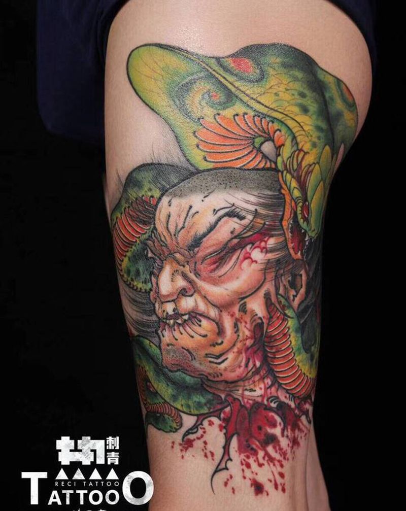 生首纹身图片_腿部新传统生首纹身图案