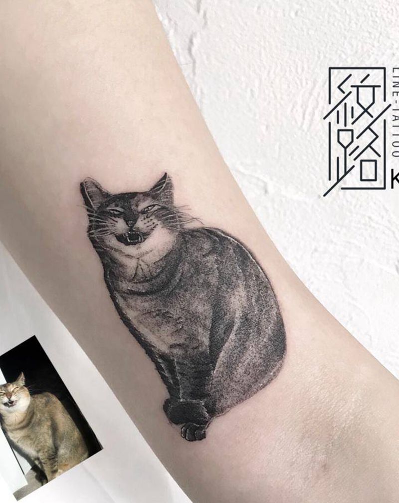 猫咪纹身图片_手臂写实猫咪动物纹身图案