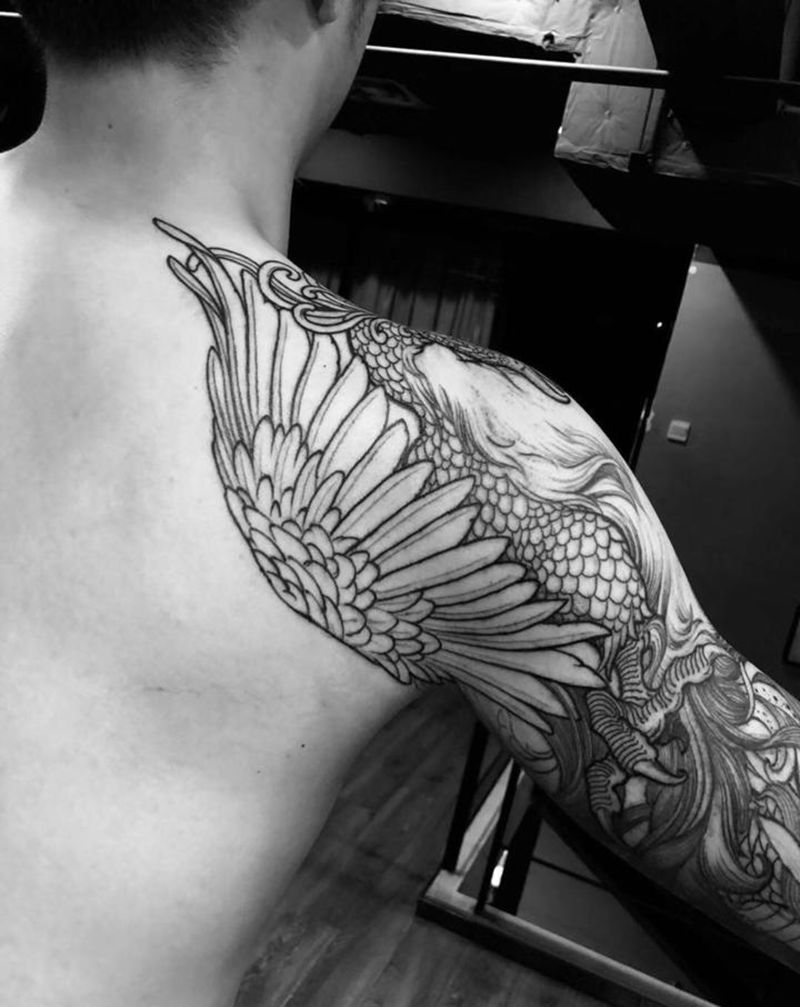 凤凰花臂纹身图片_胸部手部新传统原创纹身图案