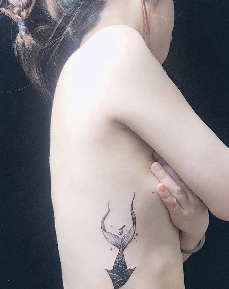 鱼尾纹身图片_腰部图腾纹身图案