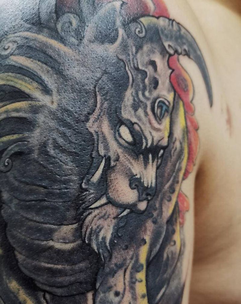 谛听纹身图片_手臂新传统旧修改纹身图案