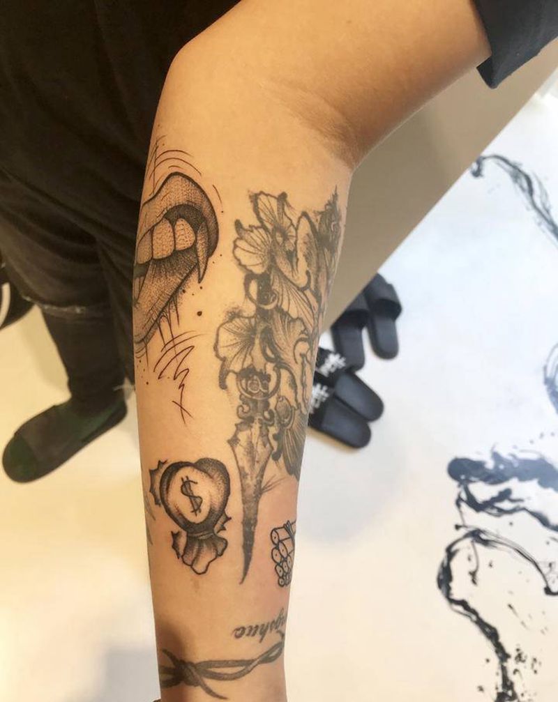 钱袋纹身图片_手臂纹身图案