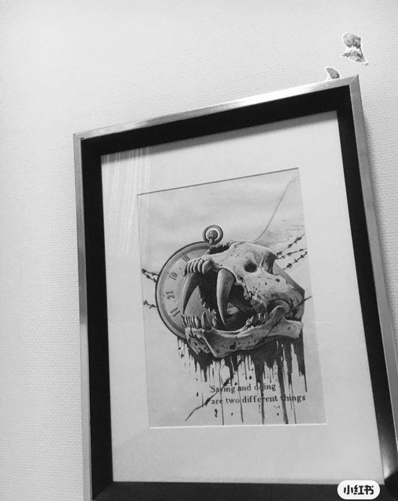 那剑齿虎头骨纹身图片_欧美写实纹身图案